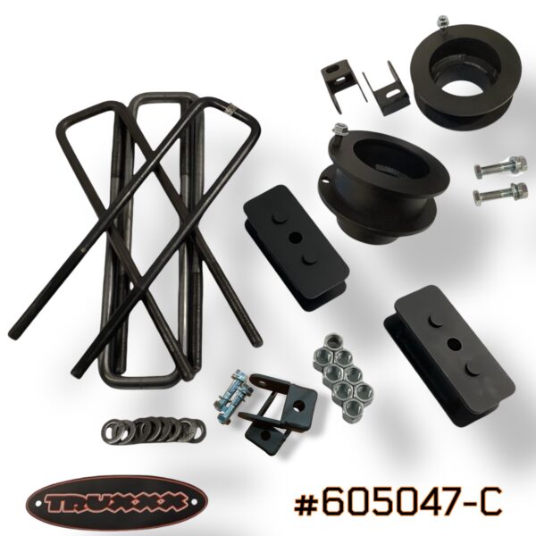 #605047-C Truxxx 605047-C 2.25-inch front and 1.0-inch rear lift kit for shock-behind-spring Ram 3500 4500 5500 Chassis Cab, showing fully welded 1/4-inch steel spacers and rear blocks.