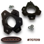 Truxxx part #707019, a 2-inch front leveling kit for 2004-2024 Nissan Titan and Titan XD, featuring heavy-duty North American steel spacers and zinc-plated hardware for a bolt-on installation.