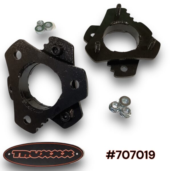 707019-.jpg Truxxx part #707019, a 2-inch front leveling kit for 2004-2024 Nissan Titan and Titan XD, featuring heavy-duty North American steel spacers and zinc-plated hardware for a bolt-on installation.