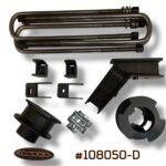 Product photo of Truxxx kit #108050-D for the 2024–2026 Ford F-450 and F-550 (DRW/Dually). The image showcases 2.5-inch front coil spacers and 2.5-inch precision-fabricated rear lift blocks. All components are manufactured from heavy-gauge North American Mill Certified Steel with a durable salt-resistant coat. Includes four high-strength custom U-bolts, heavy-duty shock brackets, and Grade 10.9/12.9 high-tensile fasteners.