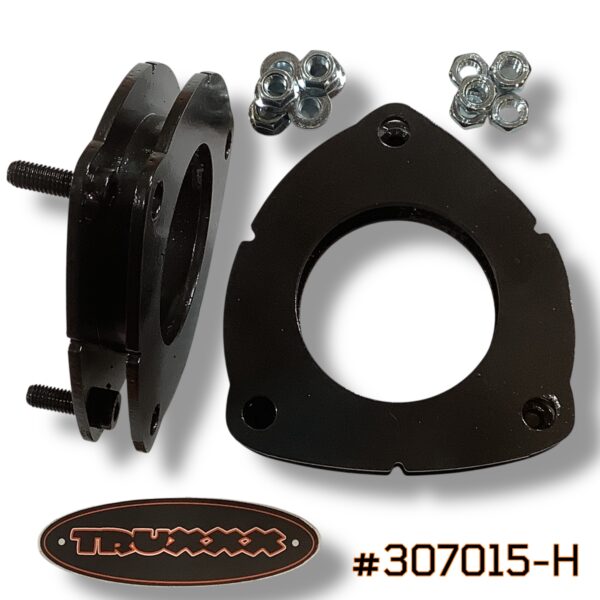 The Truxxx #307015-H "Hybrid Stance Fix" for the 2025+ Kia Carnival. A precision 1.0-inch front boost engineered with North American steel to eliminate factory rake and protect the front valance from steep inclines. No brittle plastic "pucks" that fail in the freeze—just mill-certified quality built for the 365-day gauntlet.