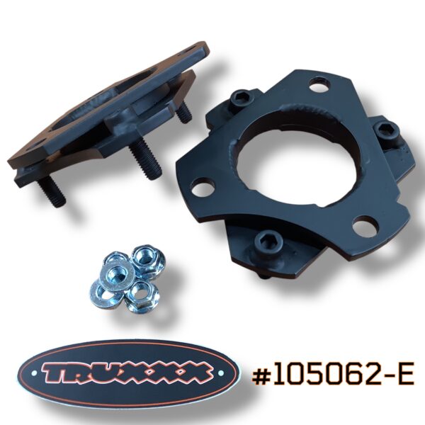 Truxxx #105062-E 1.5-inch front lift kit for the Ford Tremor, designed to eliminate factory rake while maintaining a functional stance for towing and hauling. Shown are the durable-coated steel spacers and grade-specific hardware that allow for larger tire clearance without compromising Tremor-specific shock tuning.